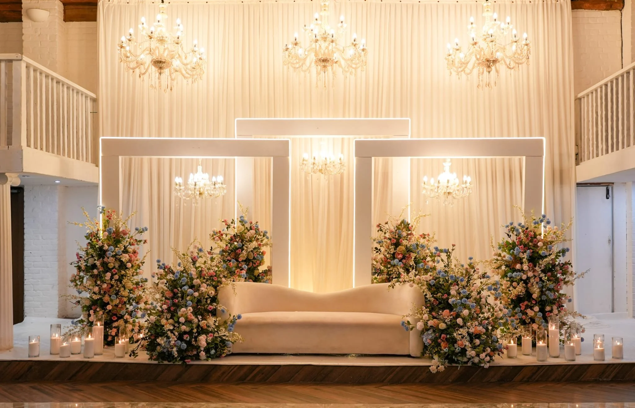 Floral wedding stage inside The Courtyard Hertfordshire